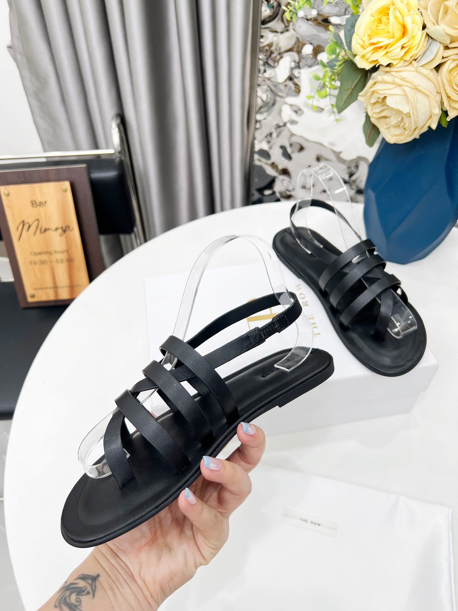 THE ROW 26S MINIMAL STRAPPY FLAT SANDALS IN BLACK CALFSKIN