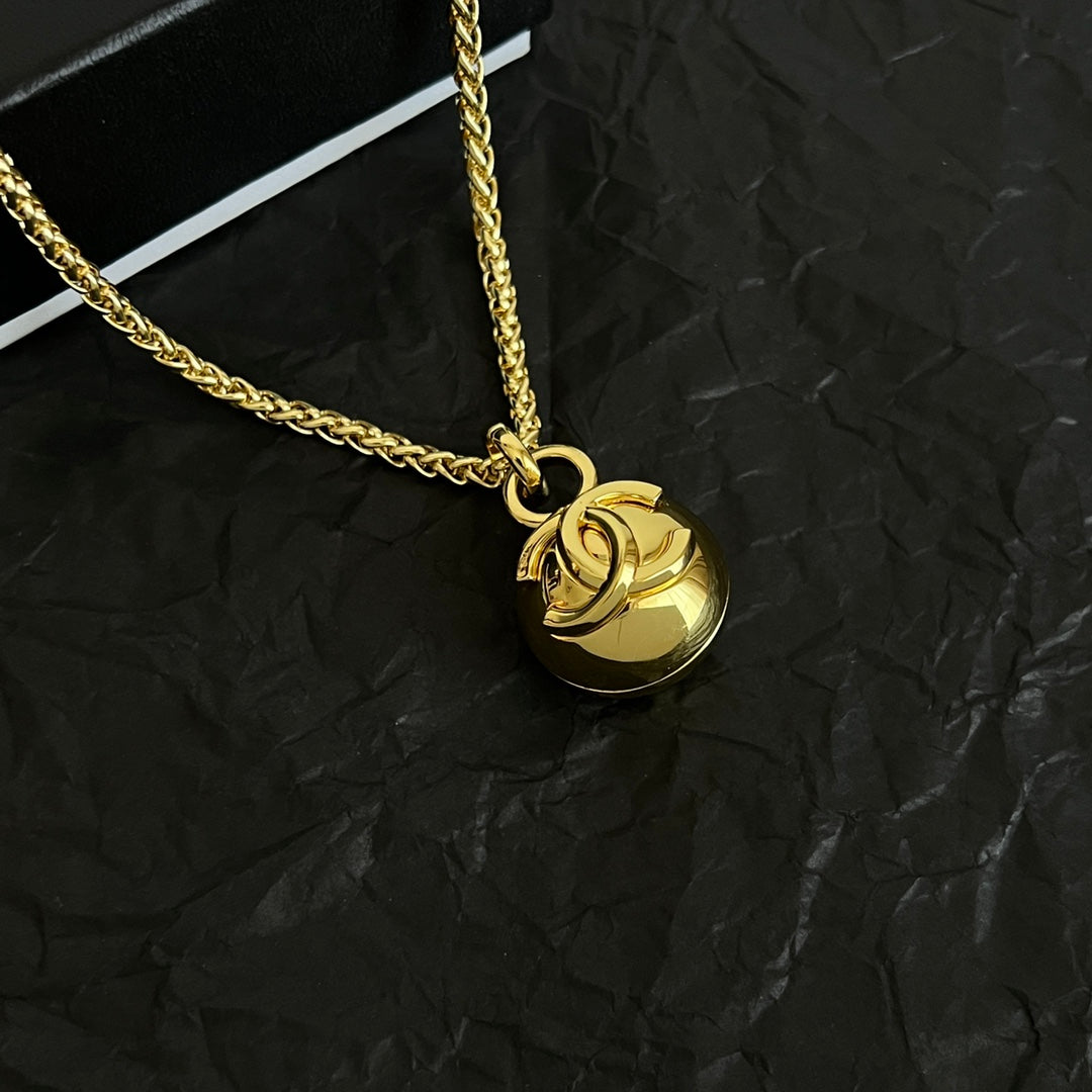 CHANEL 26S DOUBLE C LOGO SPHERE PENDANT CHAIN NECKLACE IN GOLD METAL 630892