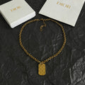CD 26S DIOR OBLIQUE ENGRAVED TAG PENDANT NECKLACE IN GOLD METAL