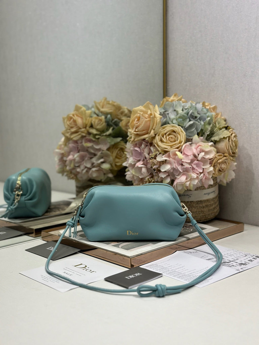 DIOR 26S BOW POUCH BAG 20 IN BLUE LAMBSKIN