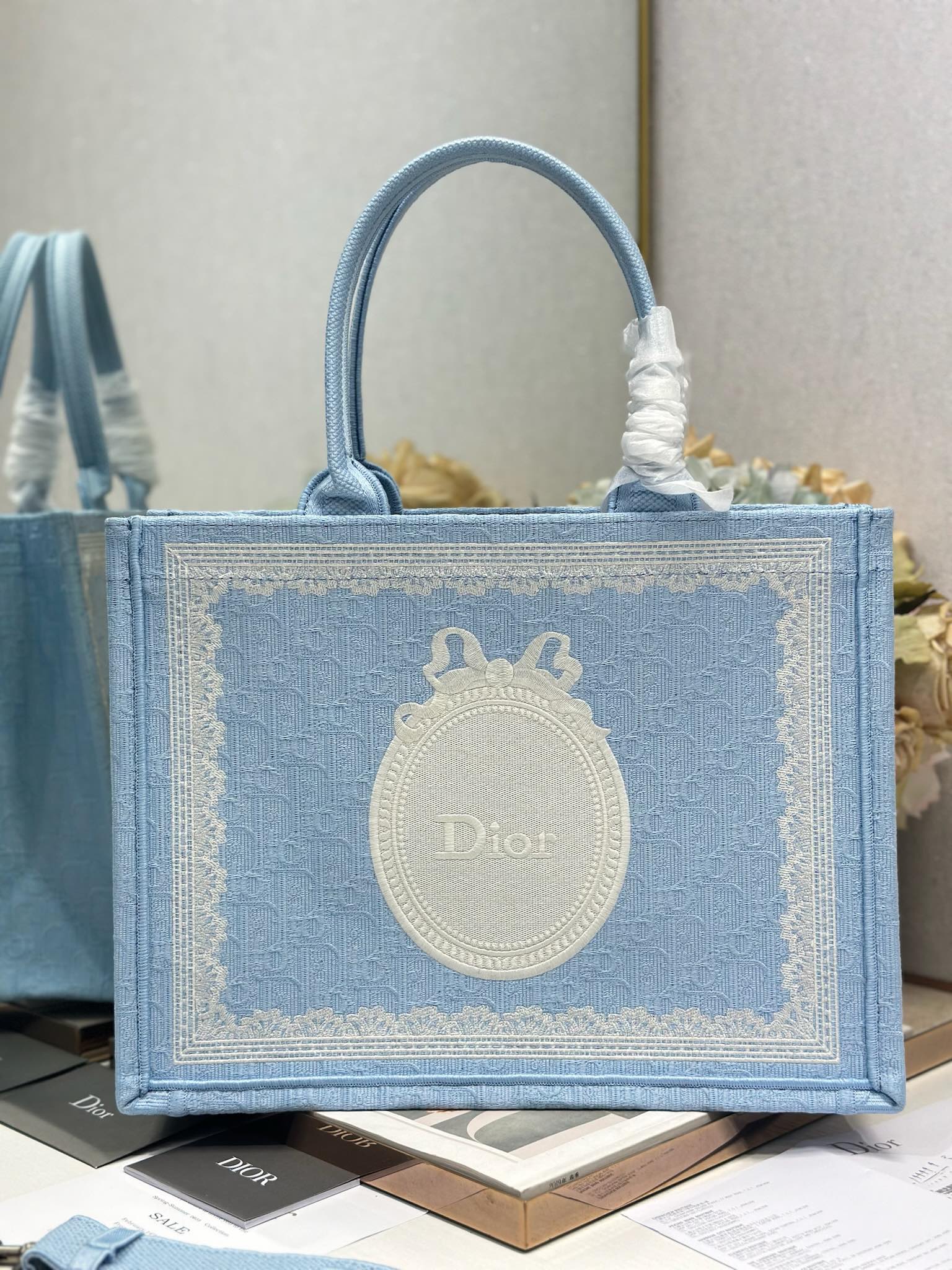 DIOR 26S BOOK TOTE BAG 36 IN BLUE AND WHITE LACE BAYADERE FABRIC
