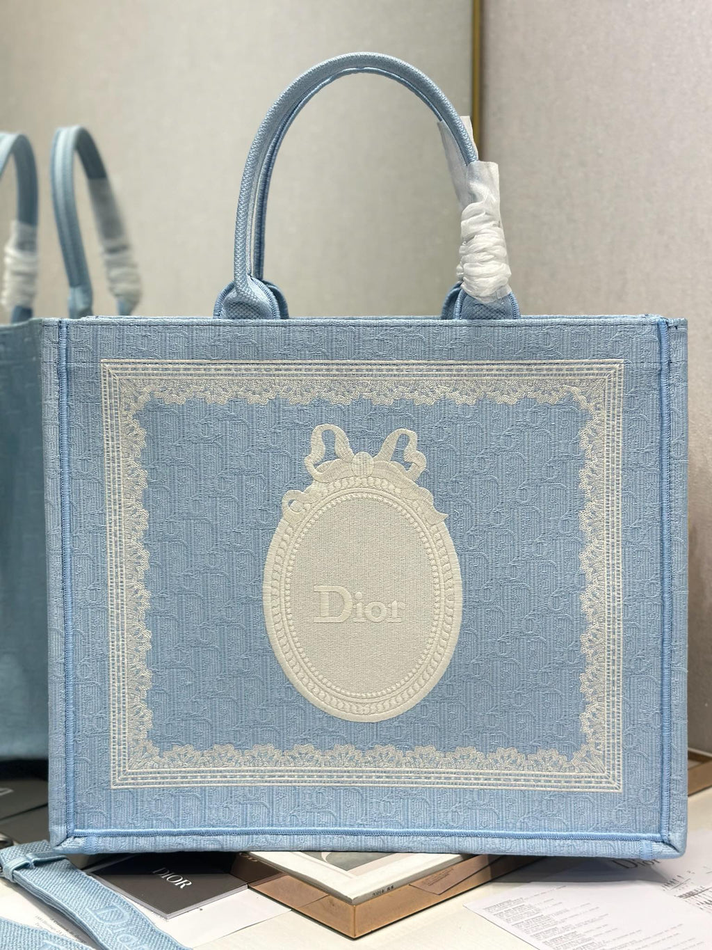 DIOR 26S BOOK TOTE BAG 42 IN BLUE AND WHITE LACE BAYADERE FABRIC