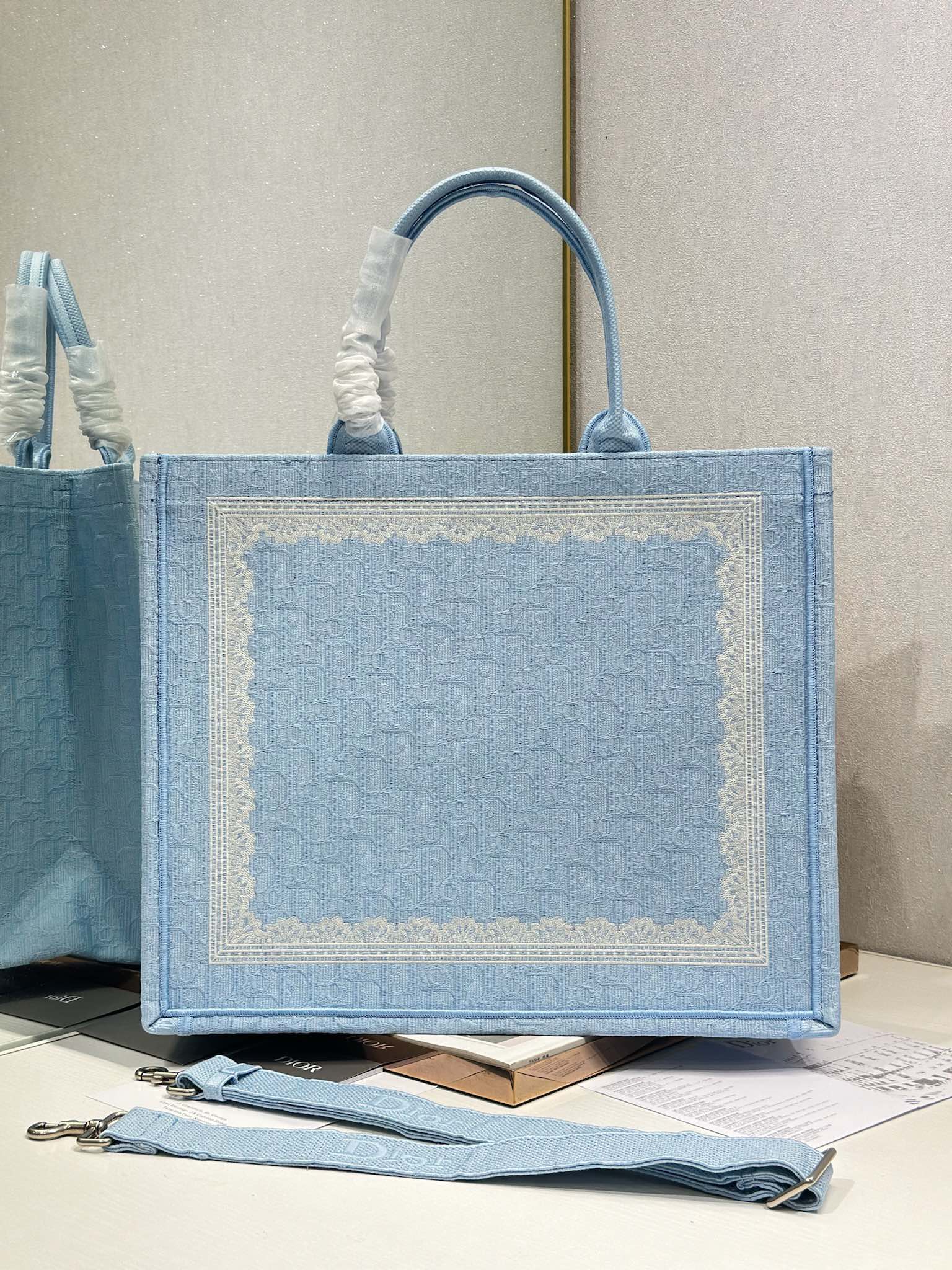 DIOR 26S BOOK TOTE BAG 42 IN BLUE AND WHITE LACE BAYADERE FABRIC