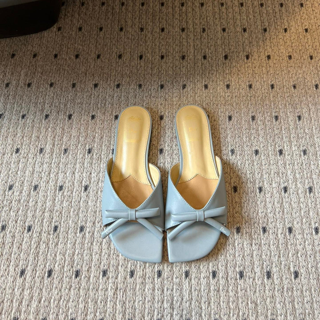 DIOR 26S OBLIQUE BOW MULE IN CLOUD BLUE CALFSKIN