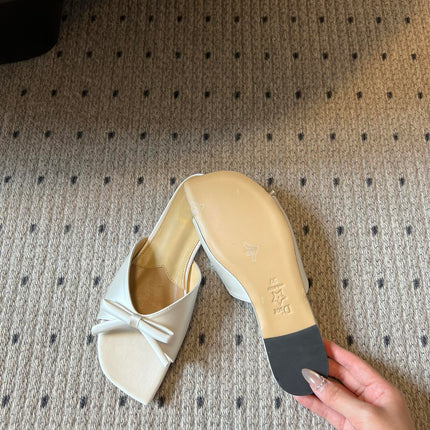 DIOR 26S OBLIQUE BOW MULE IN WHITE SATIN