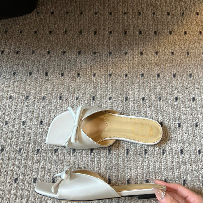 DIOR 26S OBLIQUE BOW MULE IN WHITE SATIN