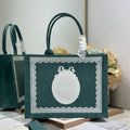 DIOR 26S BOOK TOTE BAG 36 IN TEAL GREEN AND WHITE BAYADERE FABRIC