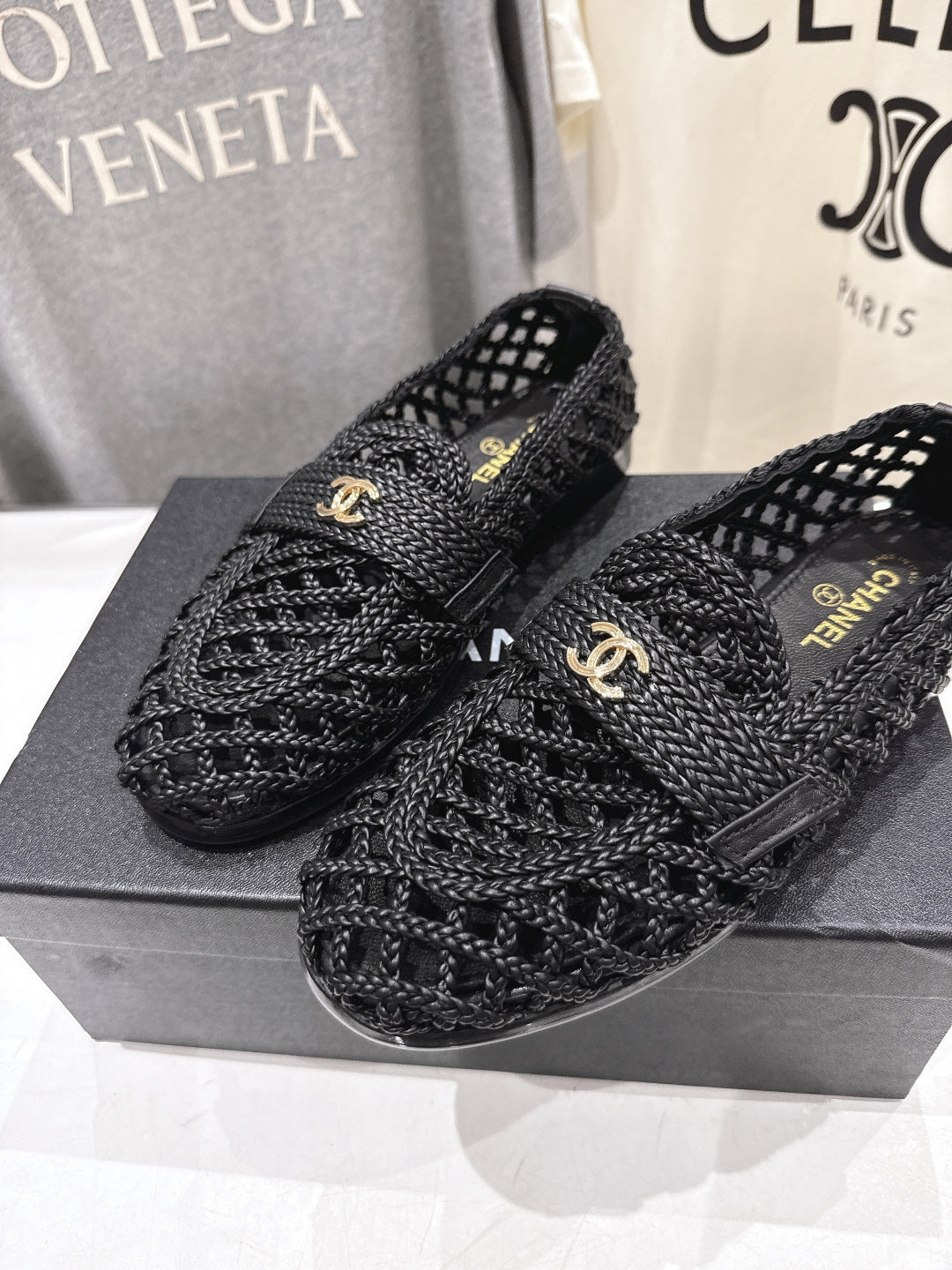 CHANEL 26S BRAIDED MULE IN BLACK WOVEN LEATHER