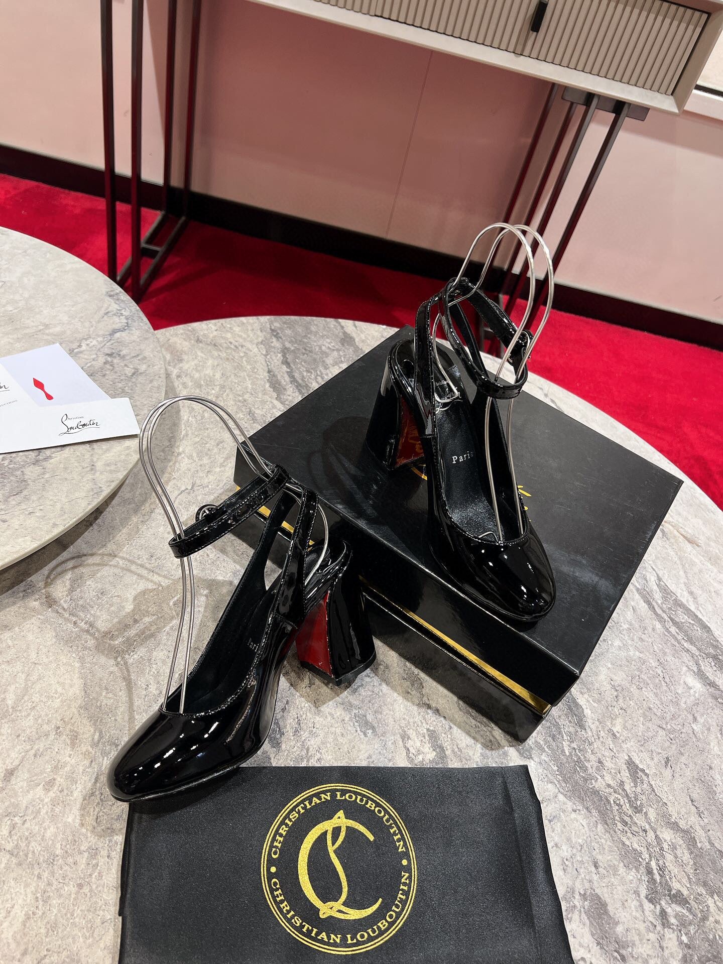 CL MISS SAB IN BLACK PATENT RED SOLE PUMPS