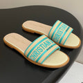 DWAY SLIDES IN BEIGE TURQUOISE CANVAS