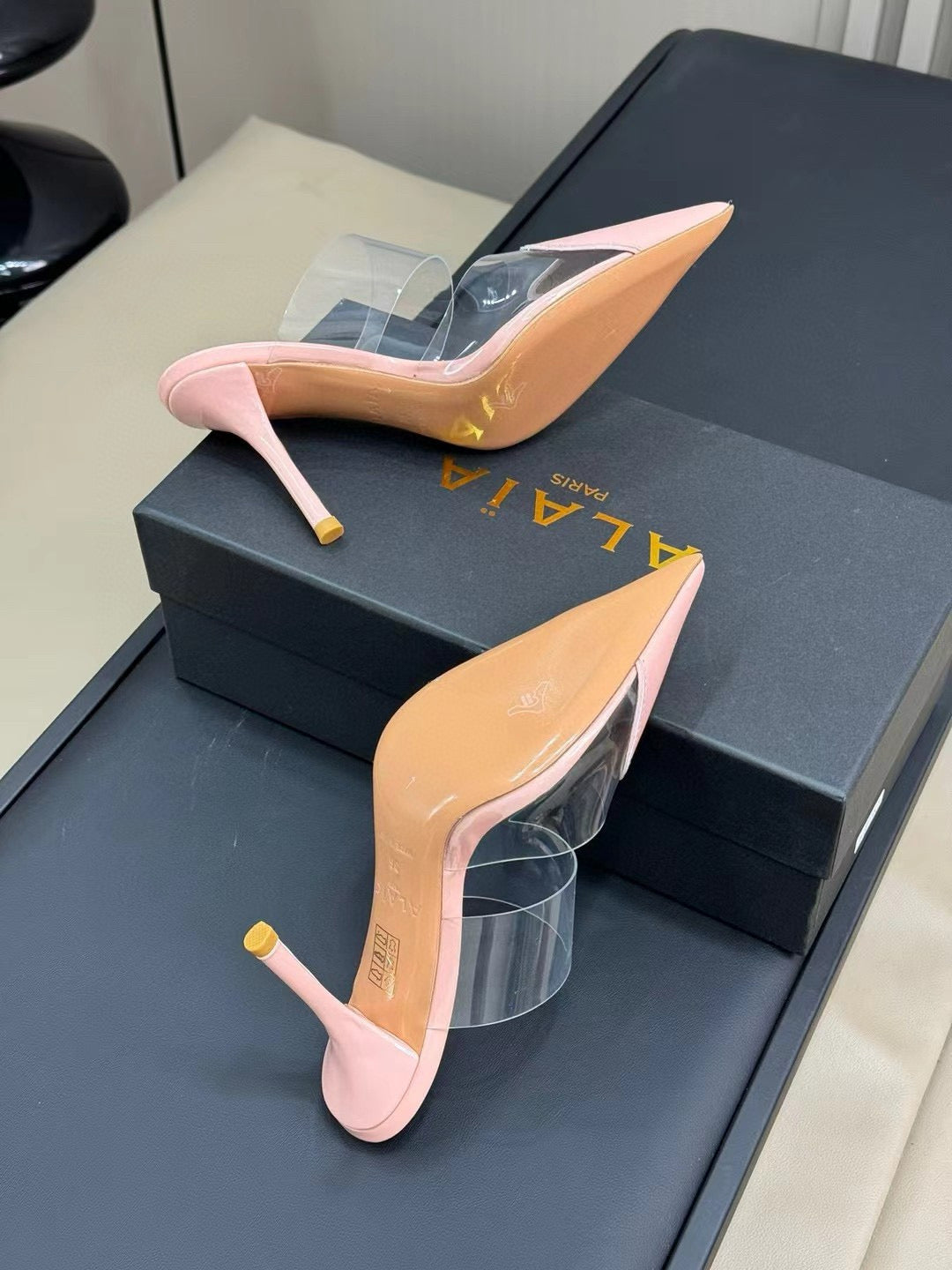 ALAIA HIGH MULES IN LIGHT PINK PATENT CALFSKIN AND FILM