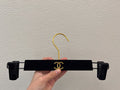Chanel hanger's in black velvet and gold hardware