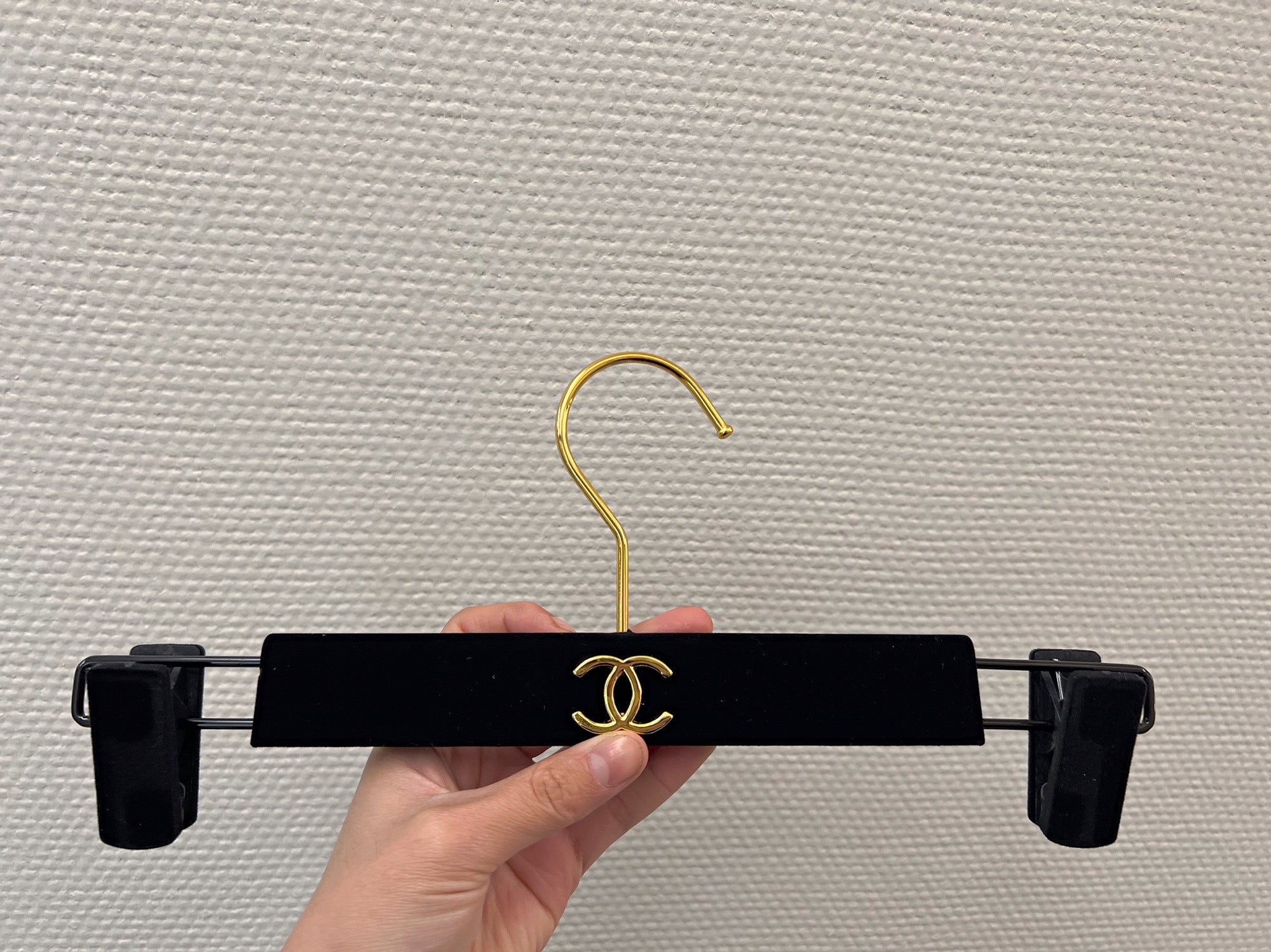Chanel hanger's in black velvet and gold hardware