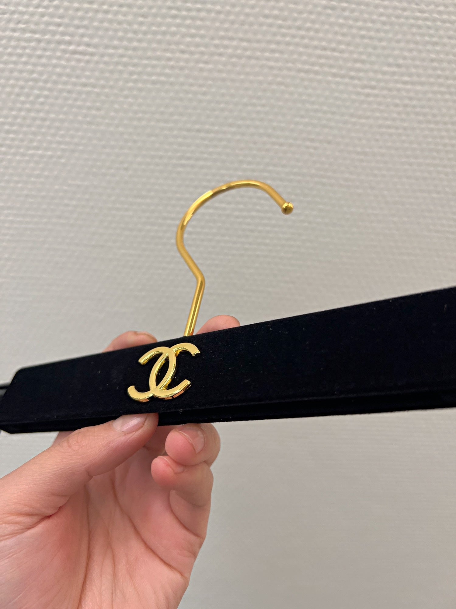 Chanel hanger's in black velvet and gold hardware