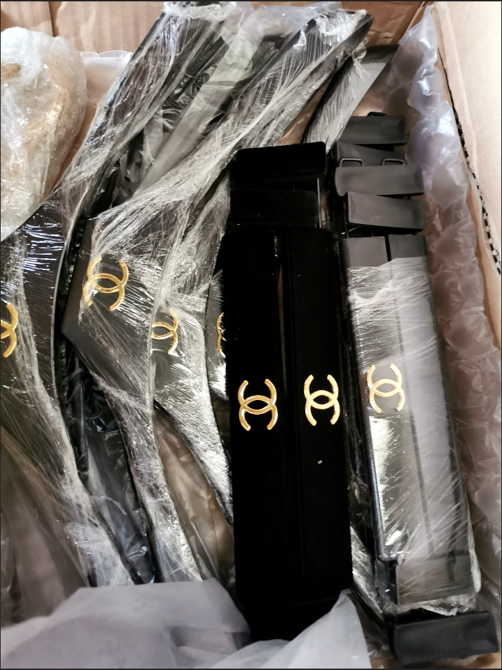 Chanel hanger's in black velvet and gold hardware
