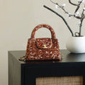 CC KELLY TOP HANDLE BAG 19 IN BROWN SEQUINED FINISH