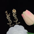 YSL EARRINGS IN SHINY GOLD