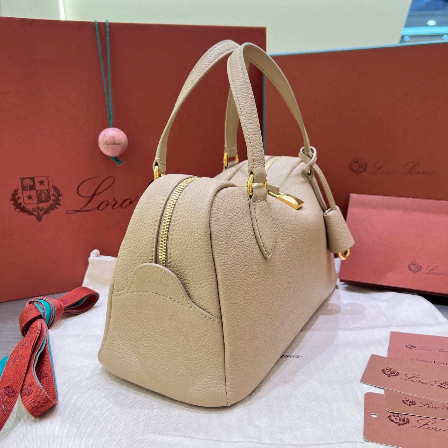 LORO PIANA NEEDLE BAG 30 IN DARK BEIGE CALFSKIN