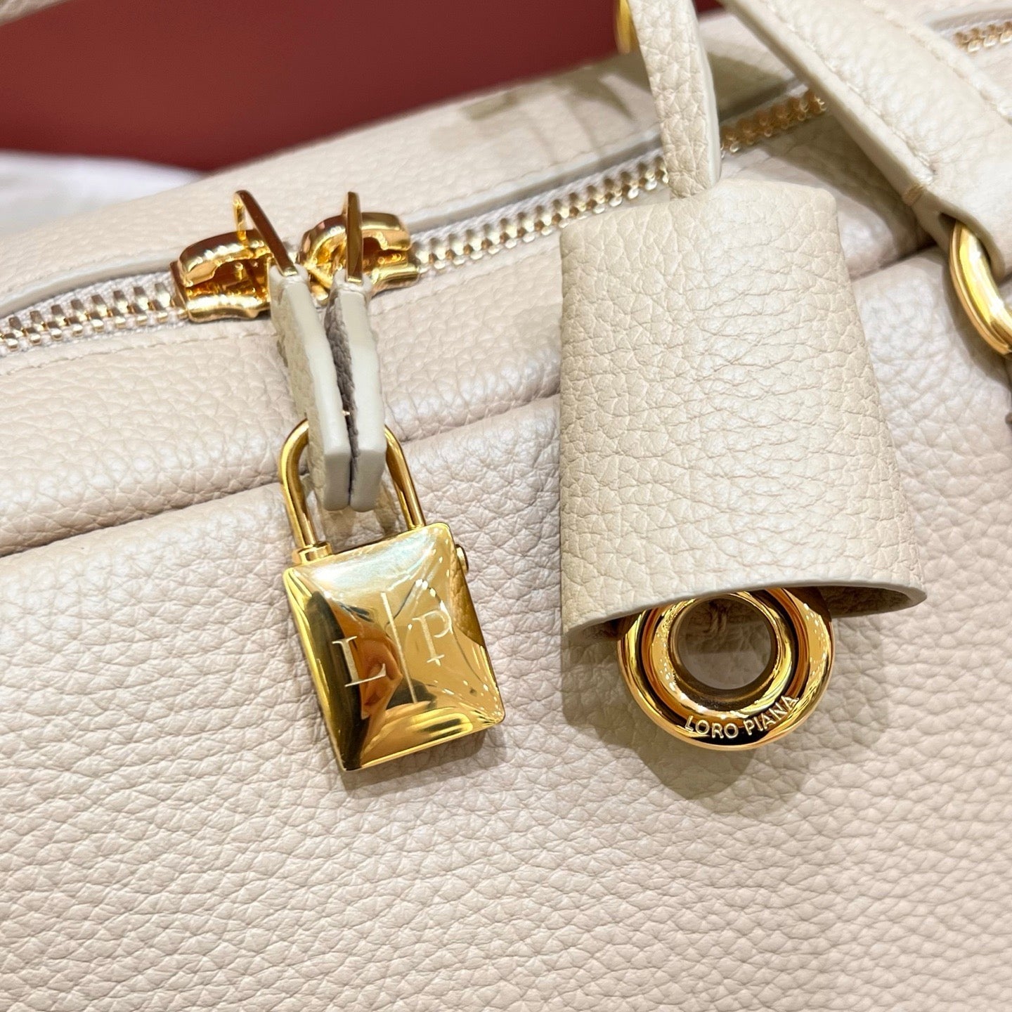 LORO PIANA NEEDLE BAG 30 IN DARK BEIGE CALFSKIN
