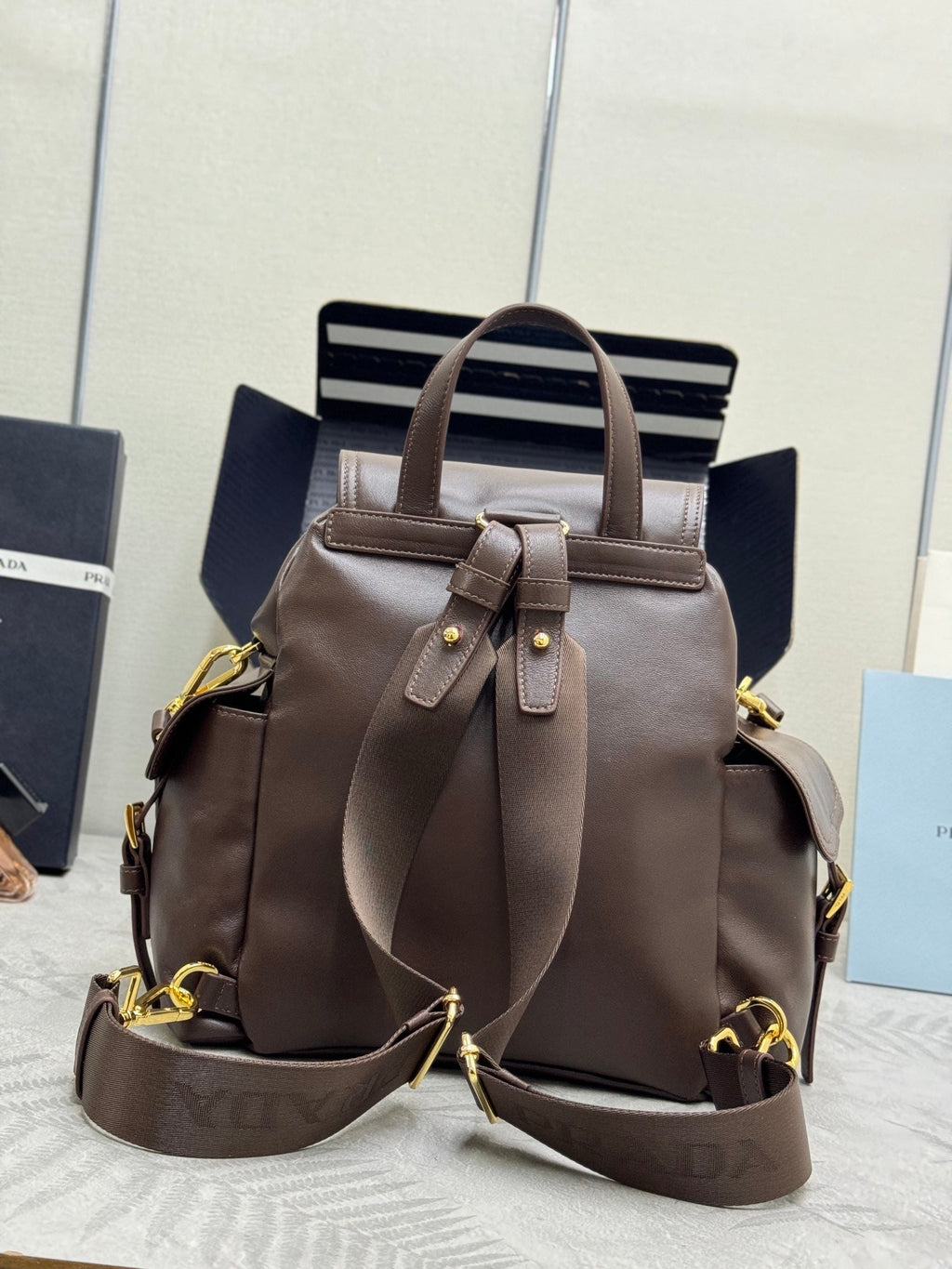 PRADA EXPLORE MEDIUM BACKPACK 29 IN BROWN CALFSKIN