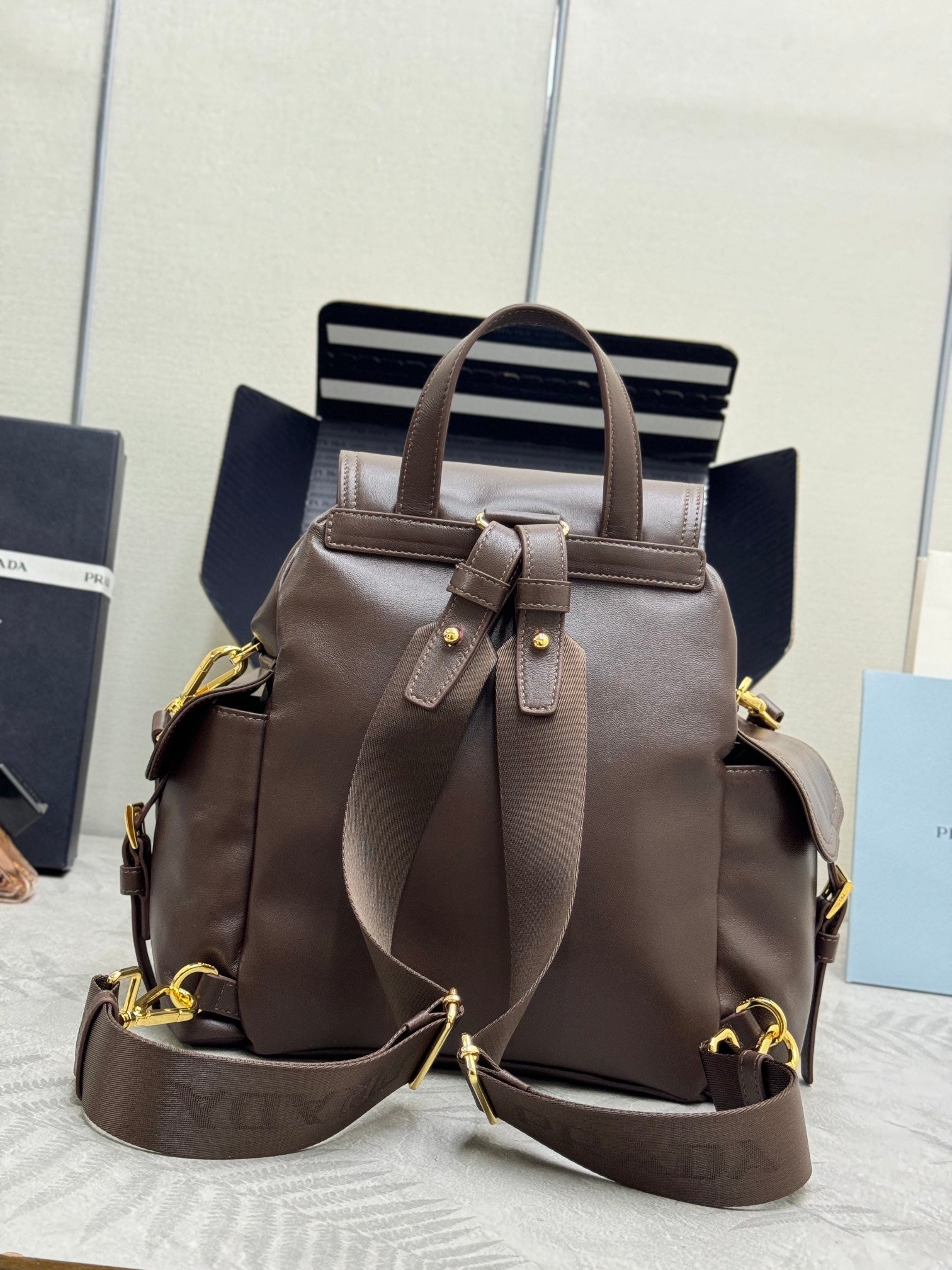 PRADA EXPLORE MEDIUM BACKPACK 29 IN BROWN CALFSKIN