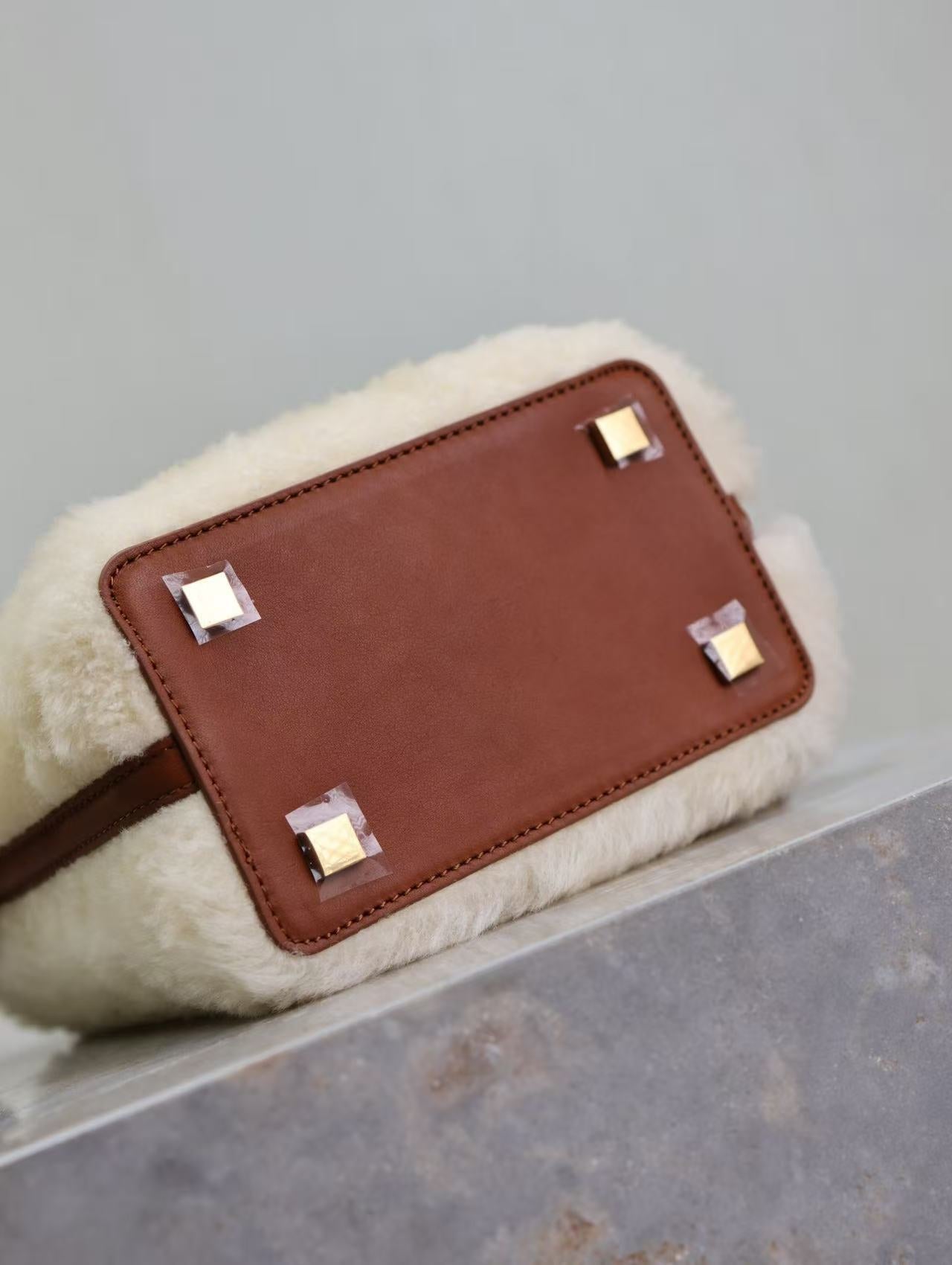 YSL LE 15 MINI SHEARLING BUCKET BAG IN CREAM BEIGE WITH LEATHER TRIM