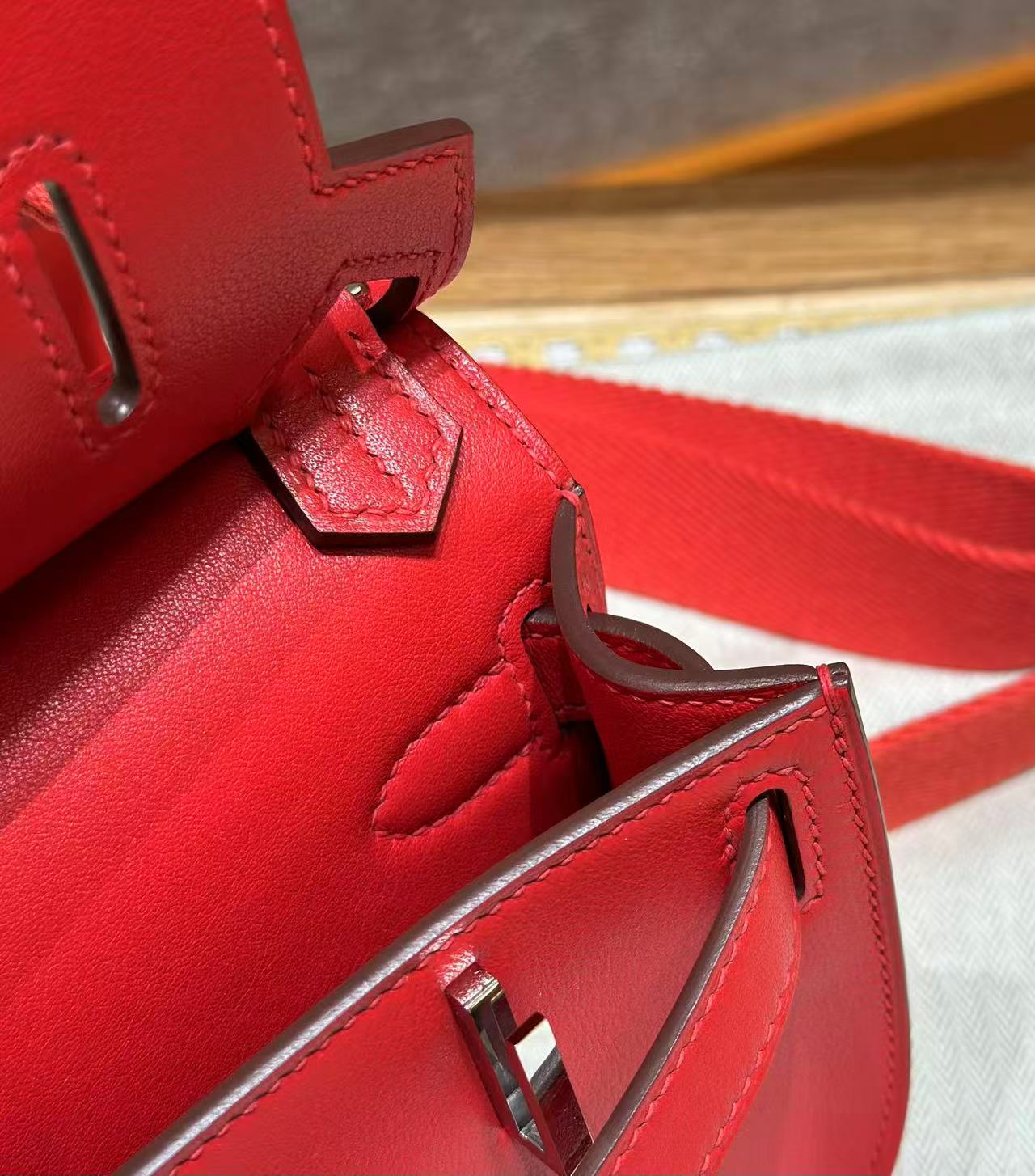 HM MINI JYPSIERE BAG IN RED SWIFT LEATHER SILVER HARDWARE.