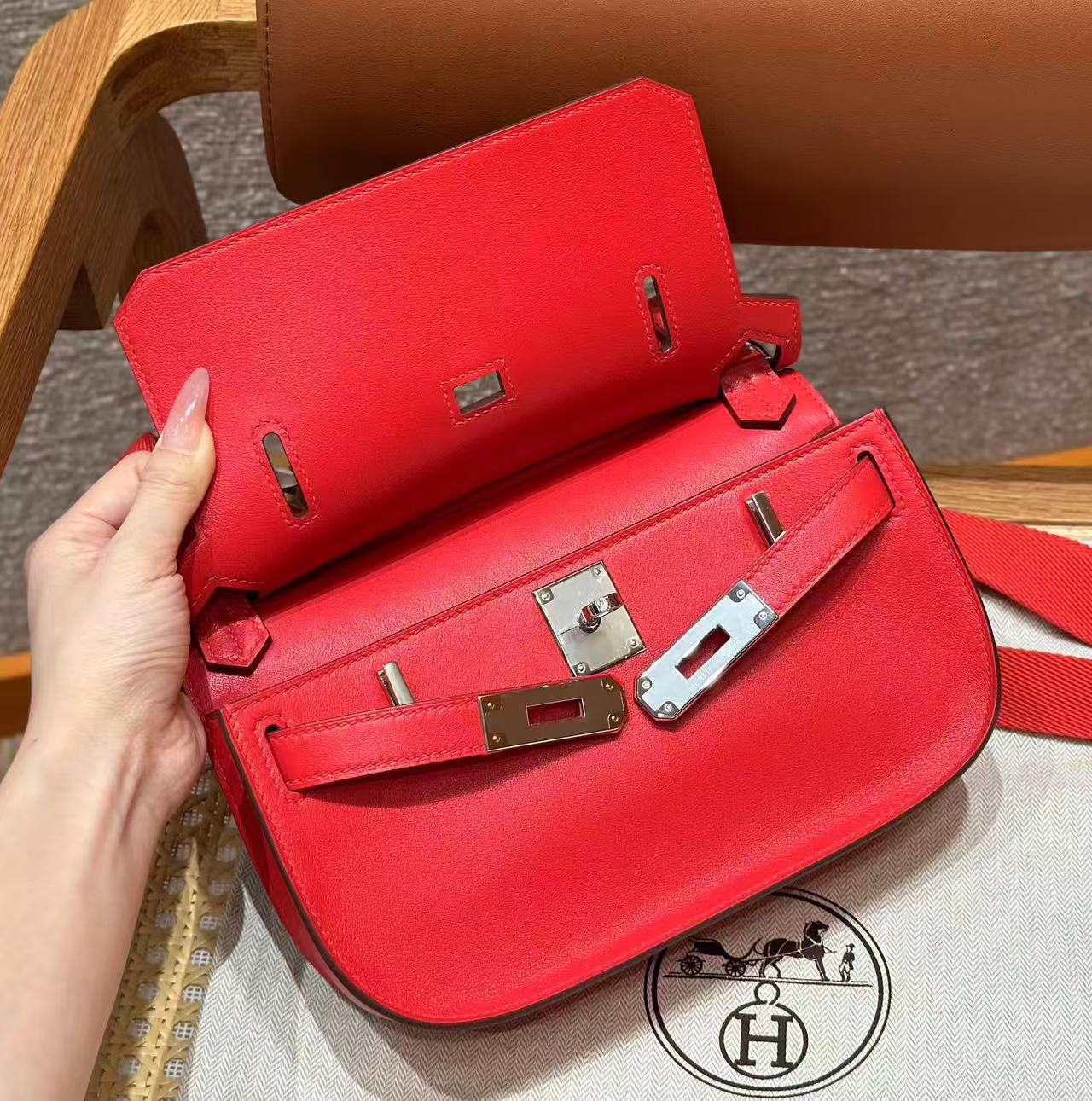 HM MINI JYPSIERE BAG IN RED SWIFT LEATHER SILVER HARDWARE.
