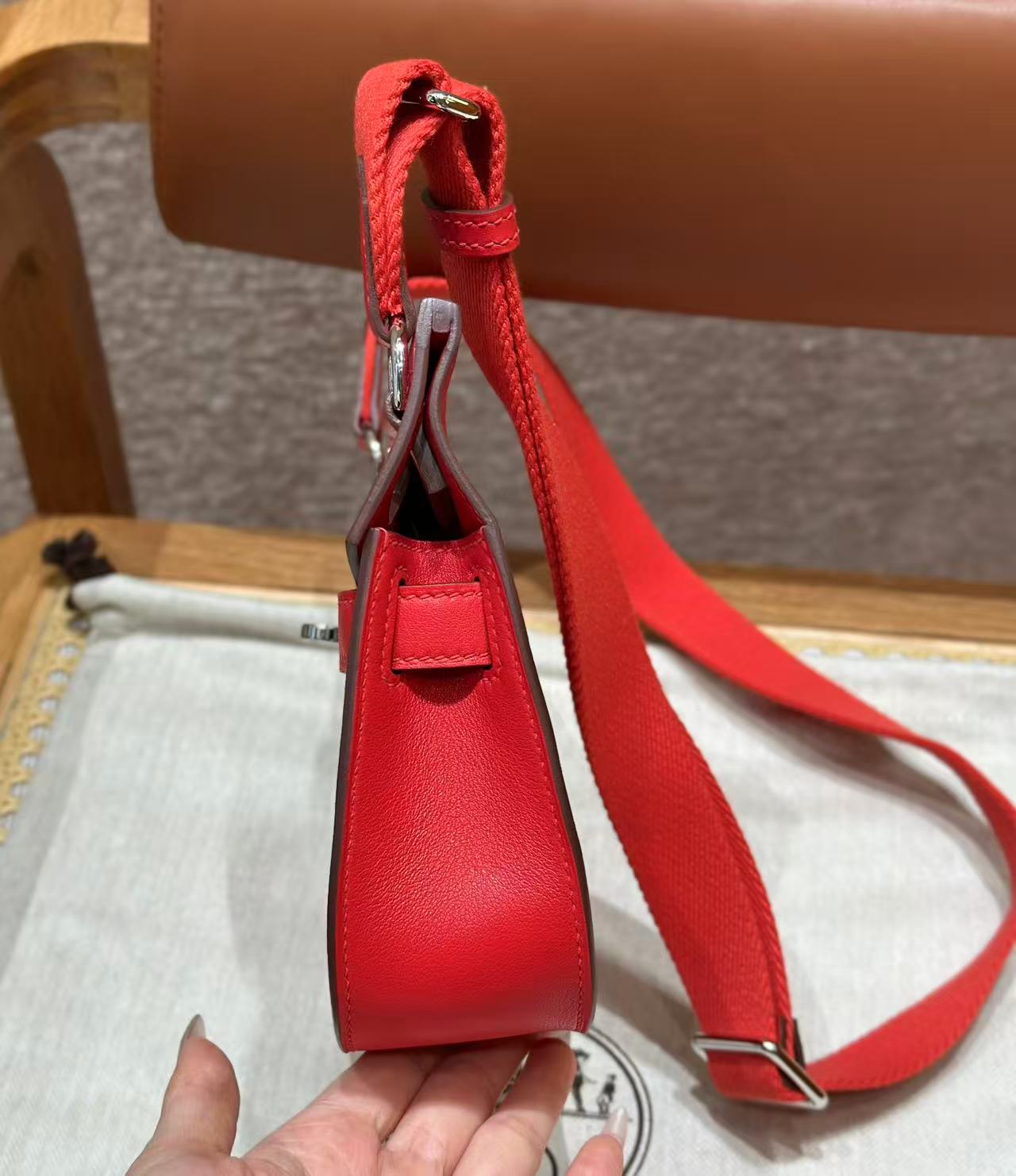 HM MINI JYPSIERE BAG IN RED SWIFT LEATHER SILVER HARDWARE.