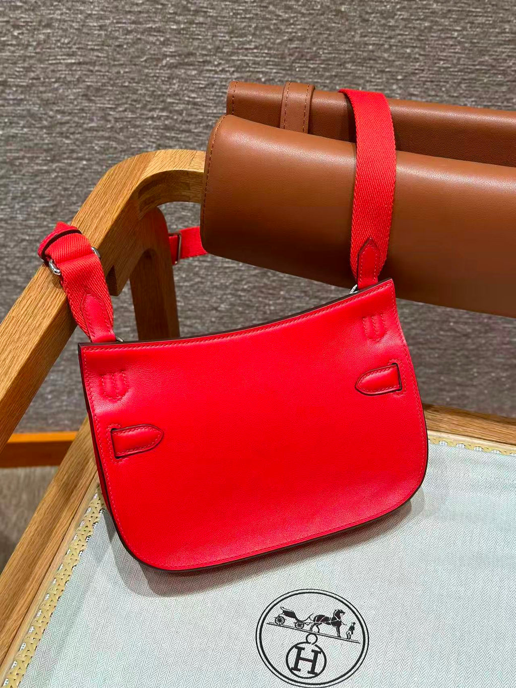 HM MINI JYPSIERE BAG IN RED SWIFT LEATHER SILVER HARDWARE.