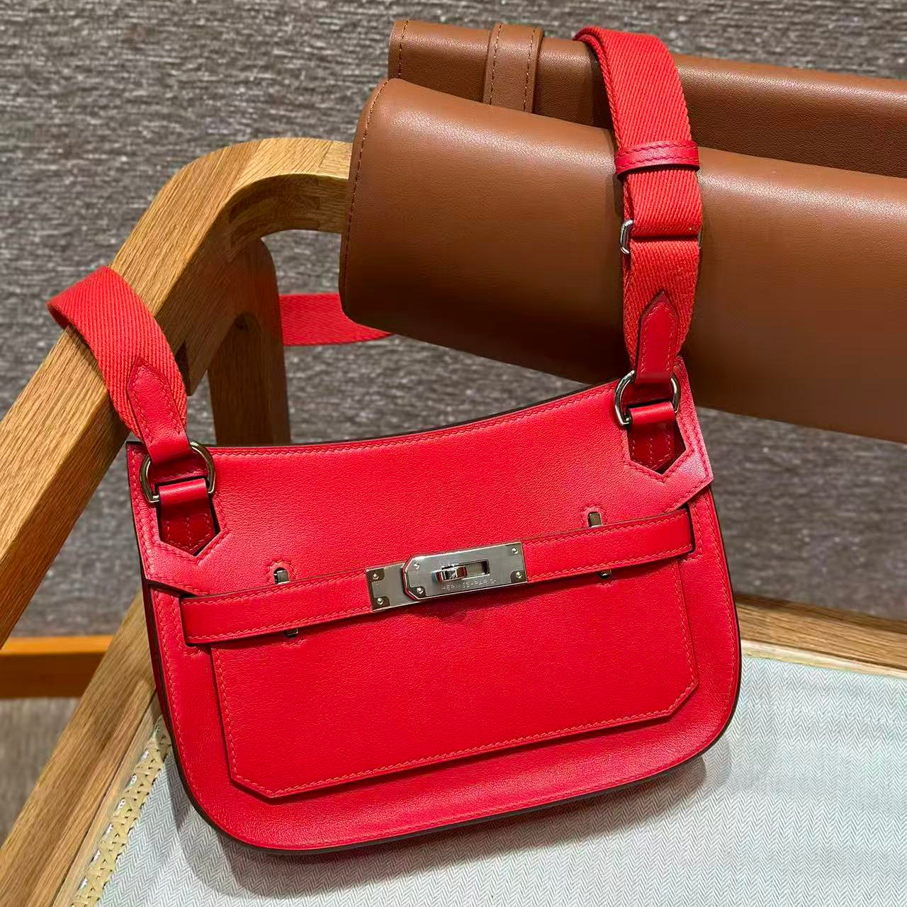 HM MINI JYPSIERE BAG IN RED SWIFT LEATHER SILVER HARDWARE.