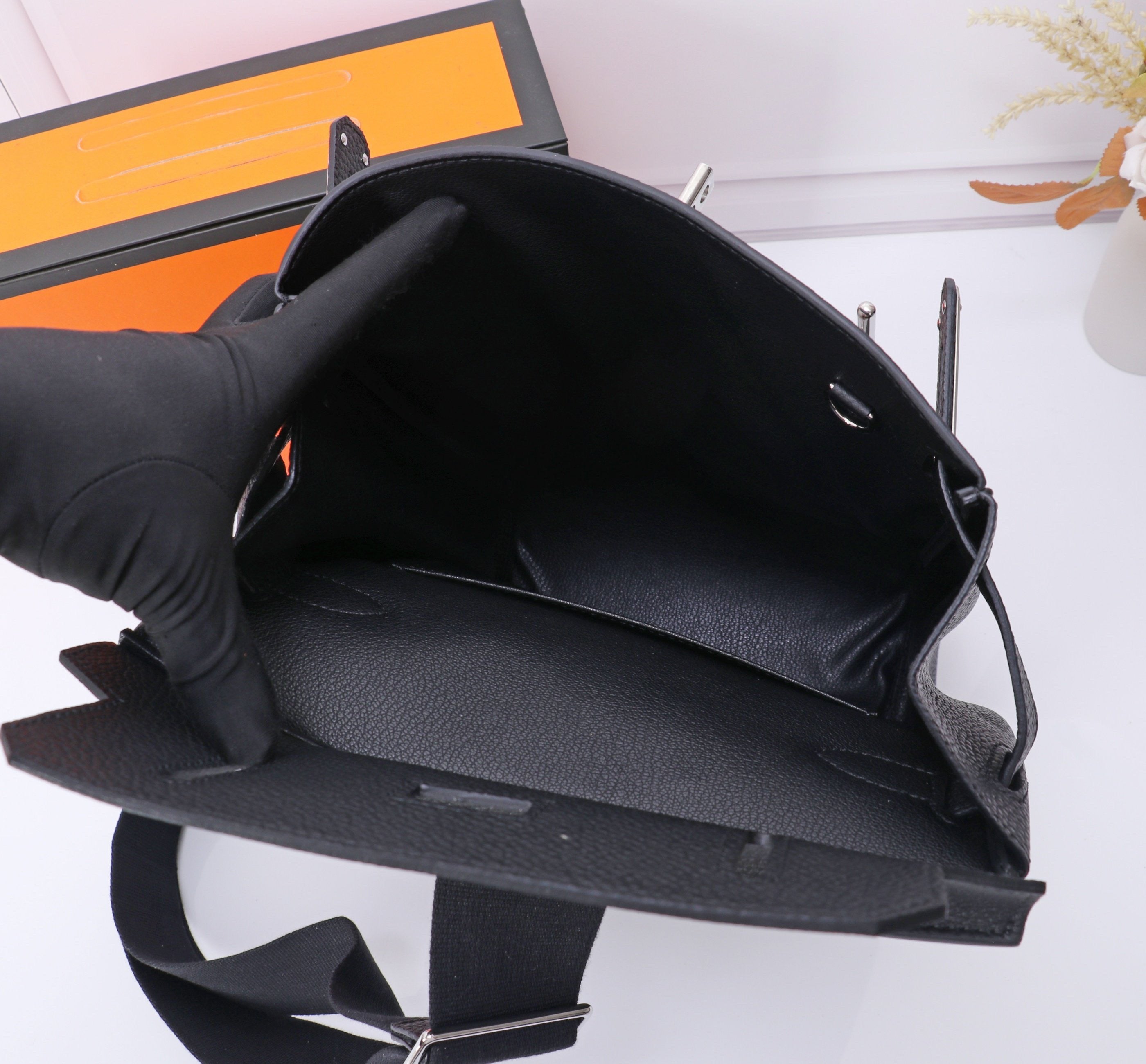 HAC A DOS PM BACKPACK 28 IN BLACK TOGO LEATHER