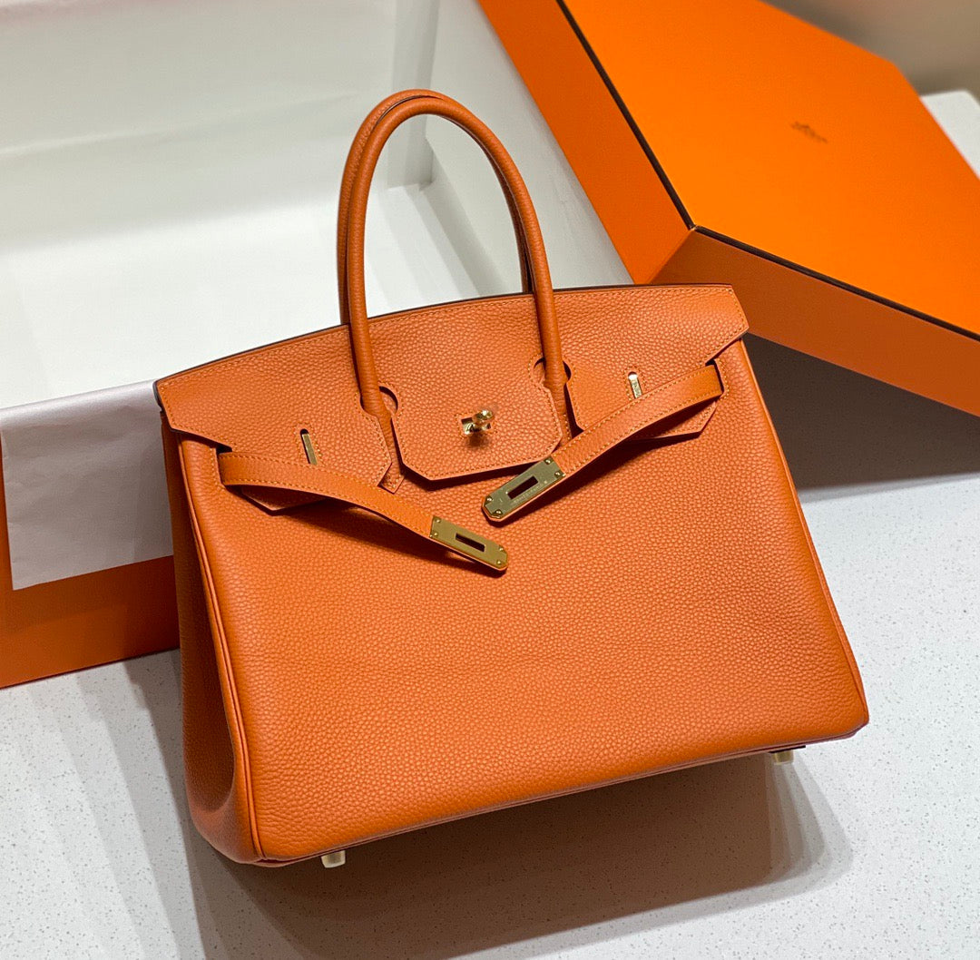 HERMES BIRKIN 35 IN LIGHT ORANGE TOGO LEATHER  GOLD HARDWARE