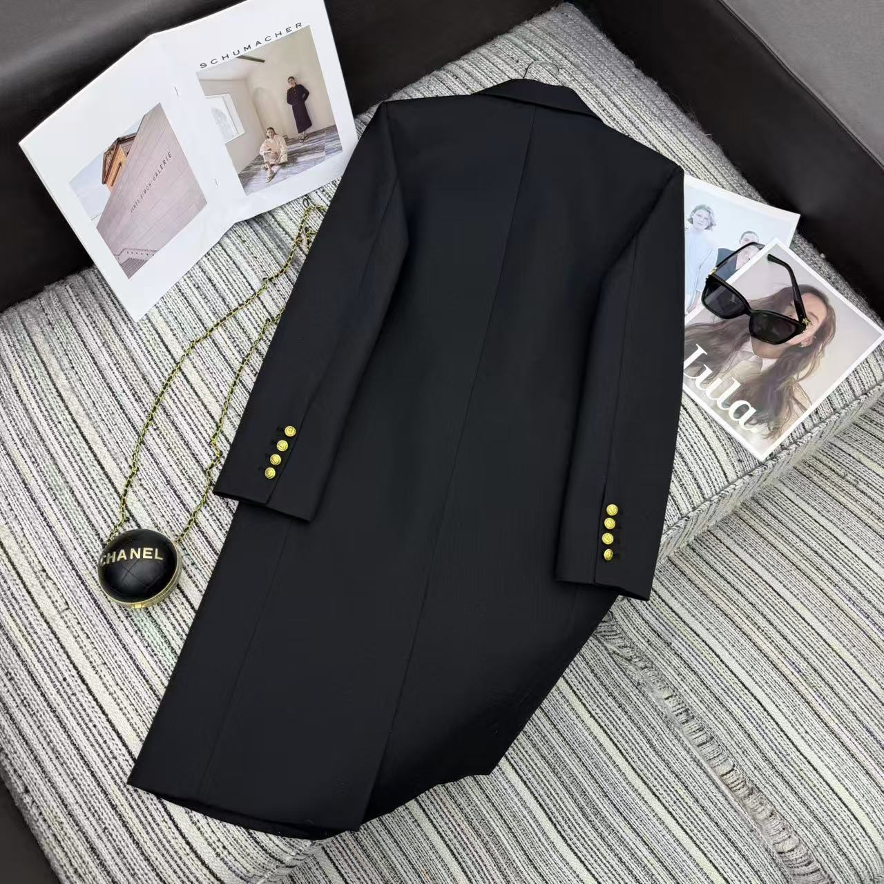 LONG COAT IN BLACK WITH GOLD BUTTONS AND A SNAKE BROOCH