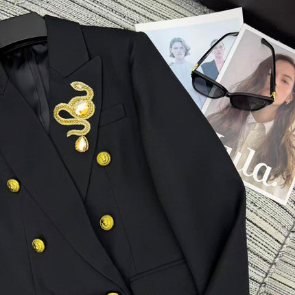 LONG COAT IN BLACK WITH GOLD BUTTONS AND A SNAKE BROOCH