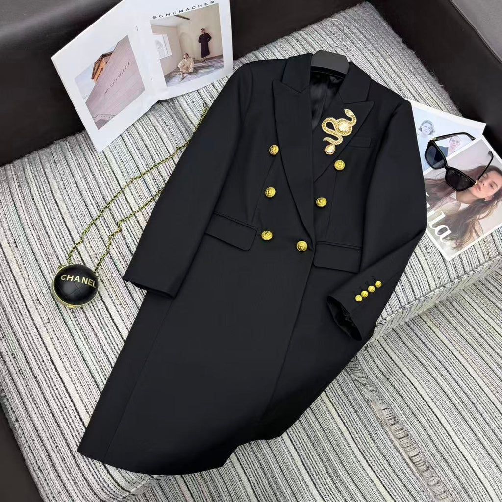 LONG COAT IN BLACK WITH GOLD BUTTONS AND A SNAKE BROOCH