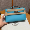 HM KELLY POCHETTE 22 IN CYAN BLUE TOGO GOLD HARDWARE