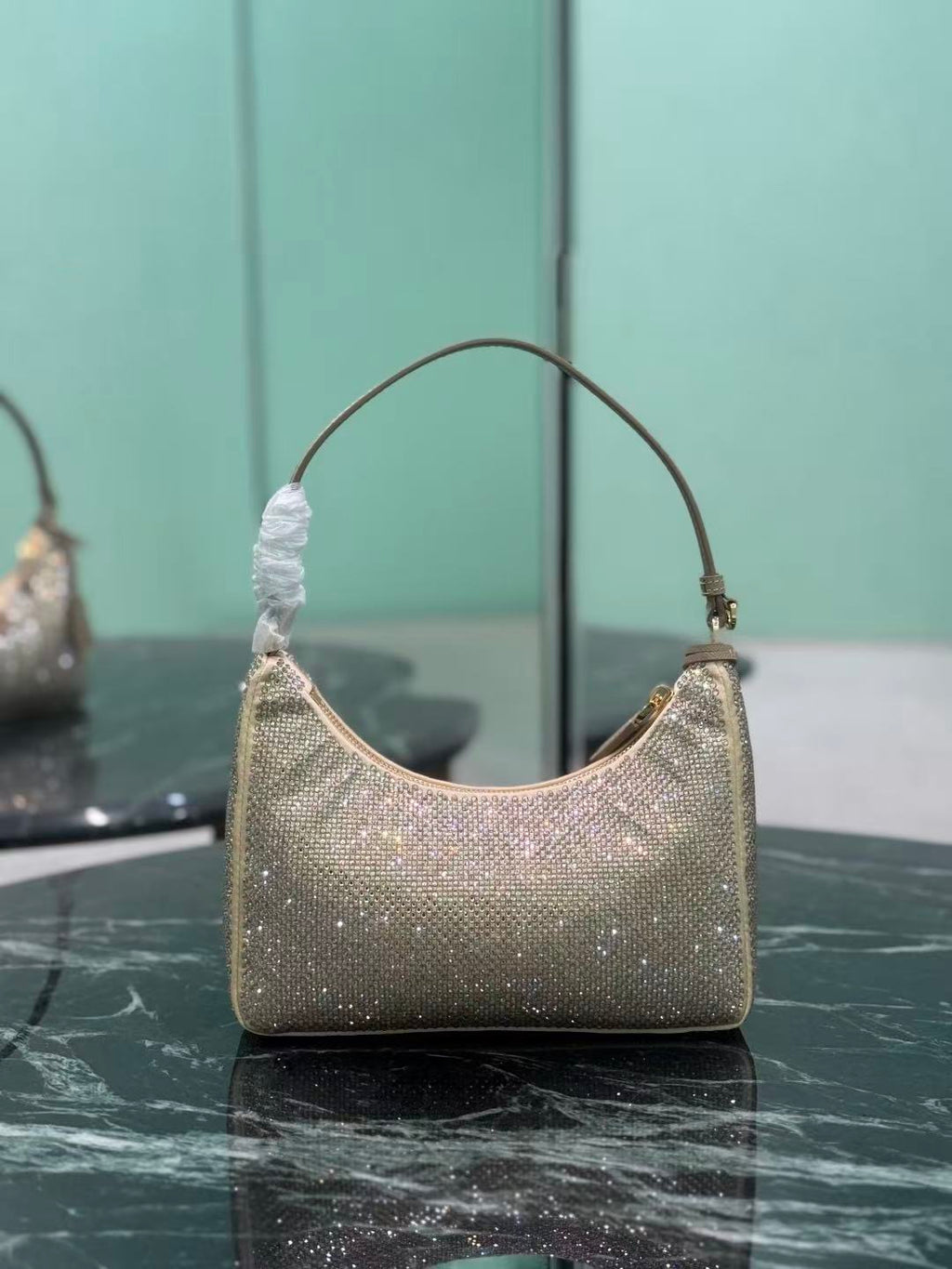 PRADA RE-EDITION 22 BAG IN BEIGE STUDDED CRYSTAL