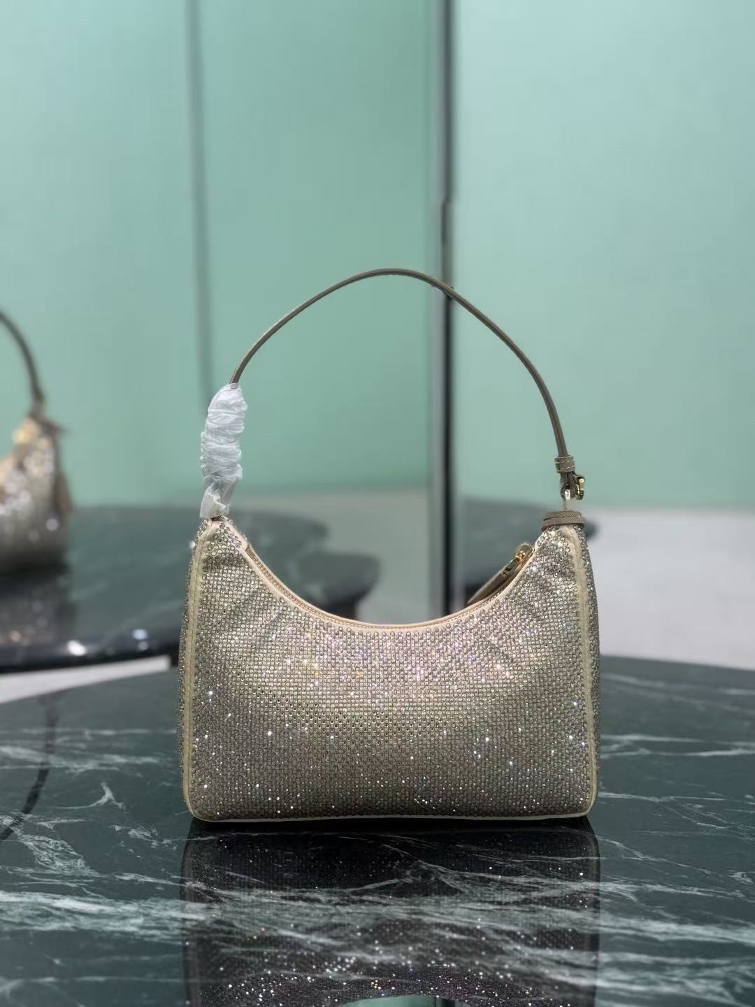 PRADA RE-EDITION 22 BAG IN BEIGE STUDDED CRYSTAL