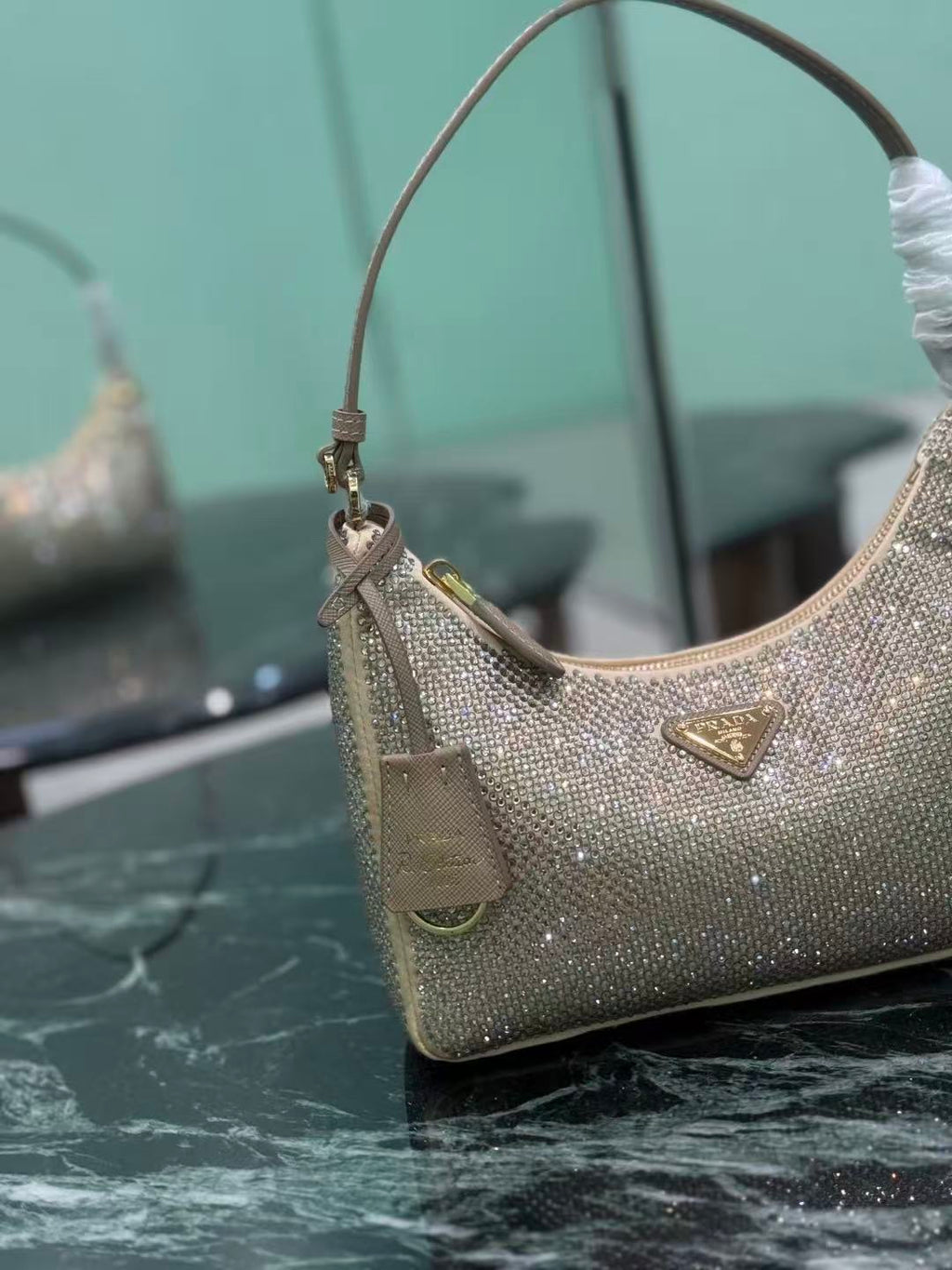 PRADA RE-EDITION 22 BAG IN BEIGE STUDDED CRYSTAL