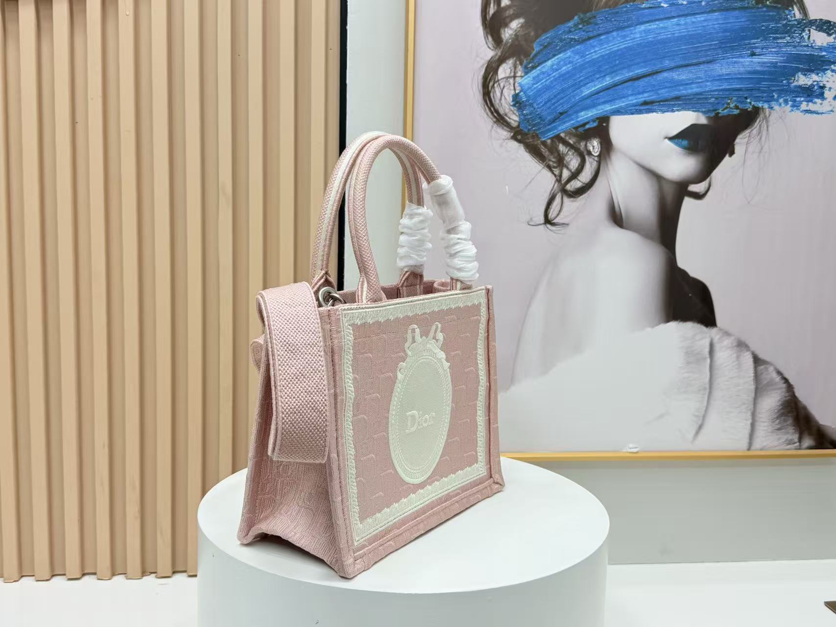 DIOR BOOK TOTE BAG 36 IN PINK COLORWAY WITH AN OVAL EMBROIDERED LOGO EMBLEM