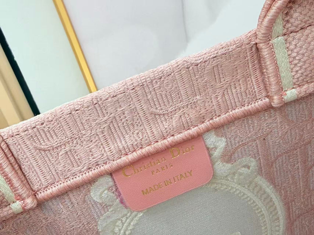 DIOR BOOK TOTE BAG 36 IN PINK COLORWAY WITH AN OVAL EMBROIDERED LOGO EMBLEM