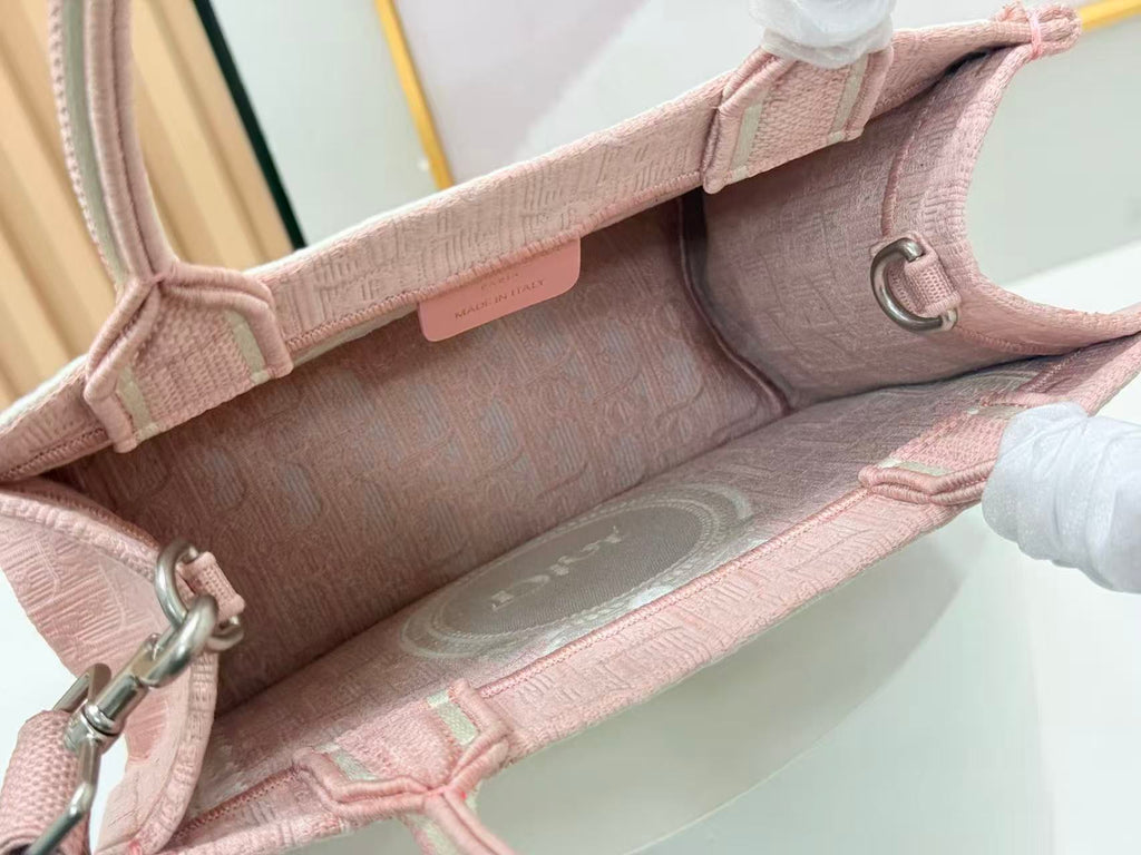 DIOR BOOK TOTE BAG 36 IN PINK COLORWAY WITH AN OVAL EMBROIDERED LOGO EMBLEM