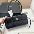 CHANEL QUILTED TOP HANDLE BAG 30 IN BLACK CALFSKIN GHW