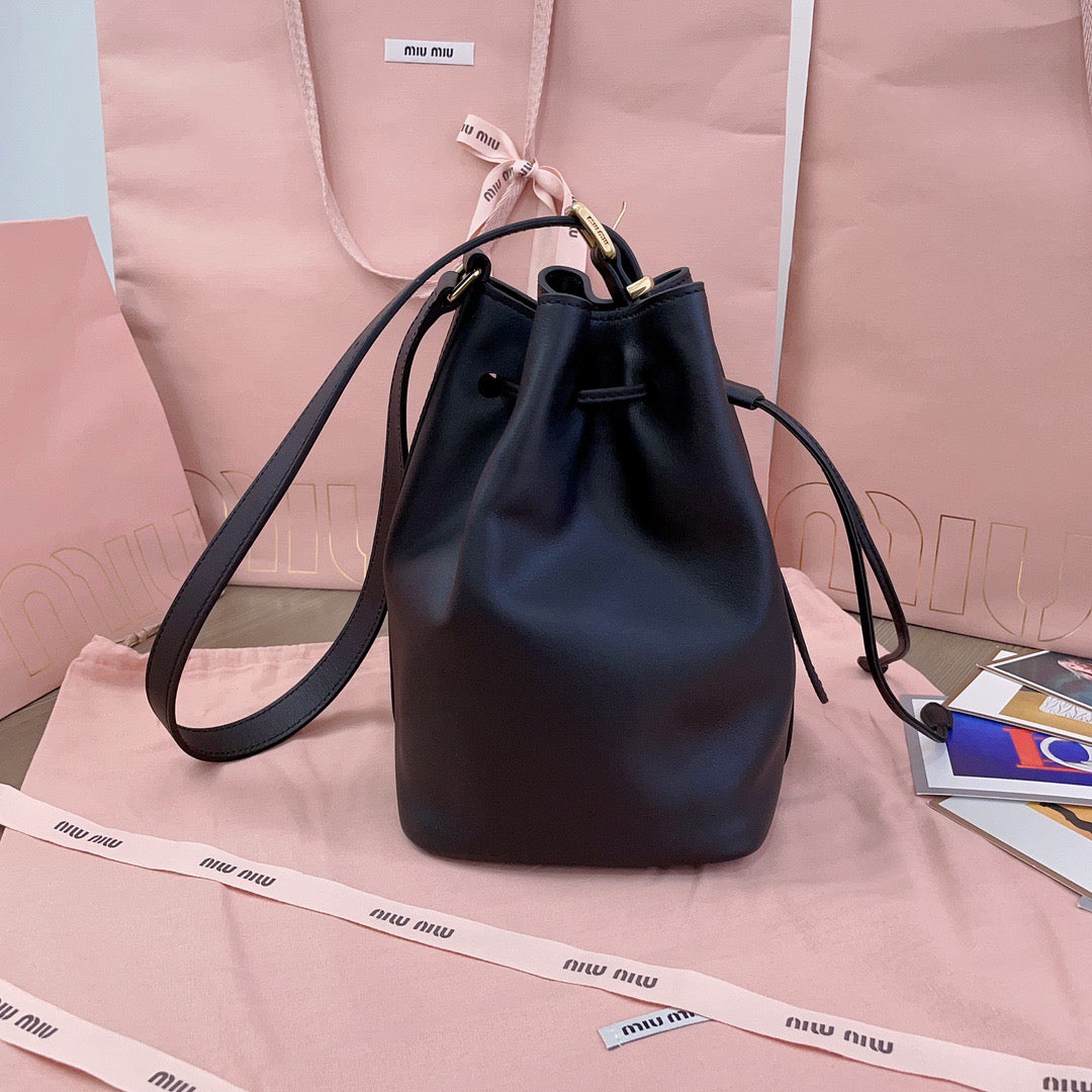MIUMIU BUCKET BAG EMBOSSED LOGO 22 IN BLACK CALFSKIN