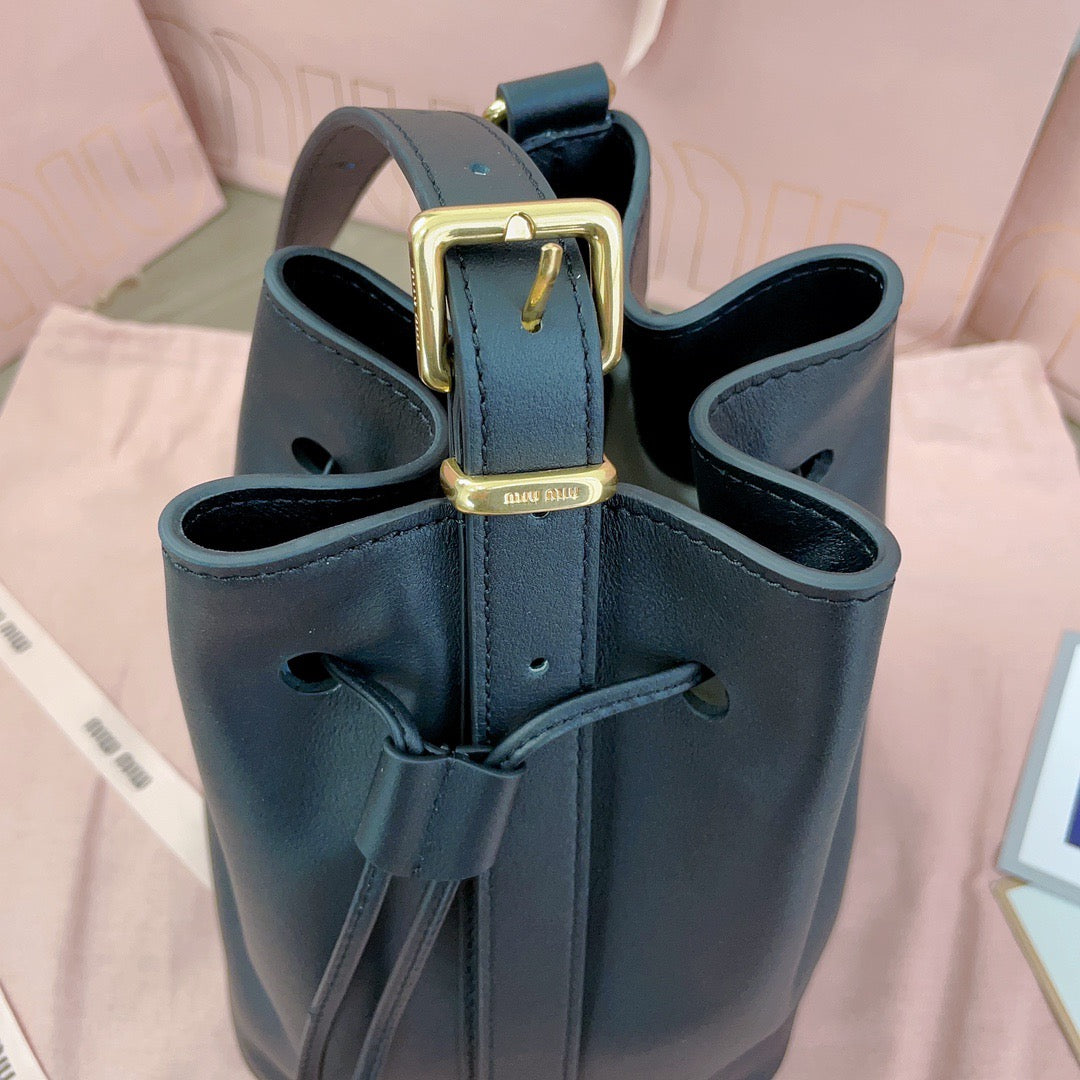 MIUMIU BUCKET BAG EMBOSSED LOGO 22 IN BLACK CALFSKIN