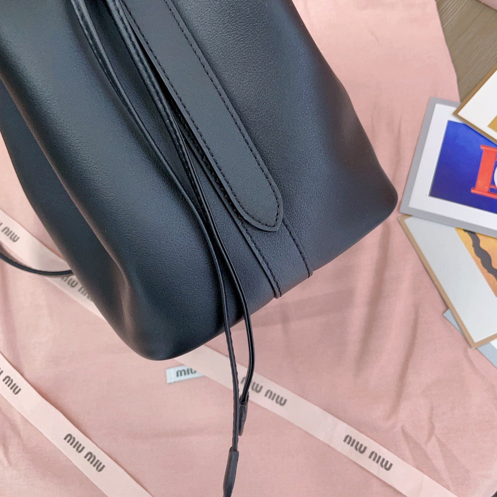 MIUMIU BUCKET BAG EMBOSSED LOGO 22 IN BLACK CALFSKIN