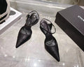 CHANEL 26S HEEL SLINGBACK EMBOSSED LOGO IN BLACK CALFSKIN