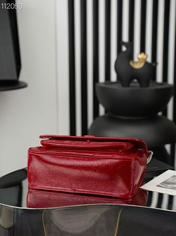 YSL MEDIUM NIKI BAG IN RED GLOSSY CALFSKIN AND HARDWARE