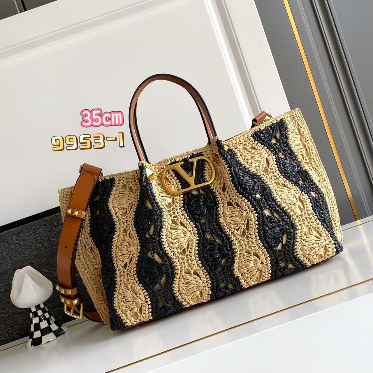 VALENTINO GARAVANI  VLOGO SIGNATURE MEDIUM 35 IN NATURAL AND BLACK RAFFIA